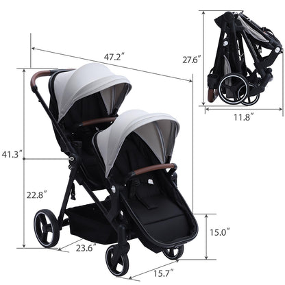 Dark grey tandem double stroller for newborn and toddler, with reversible seats, adjustable canopy, large storage, and one-hand fold.