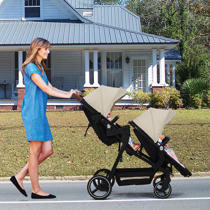Dark grey tandem double stroller for twins with reversible seats, adjustable canopy, 5-point harness, large storage basket, and one-hand fold.